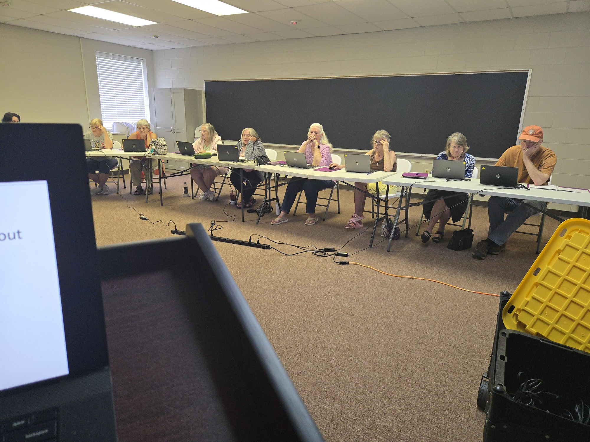 Participants in an AI Essentials workshop with MECAA