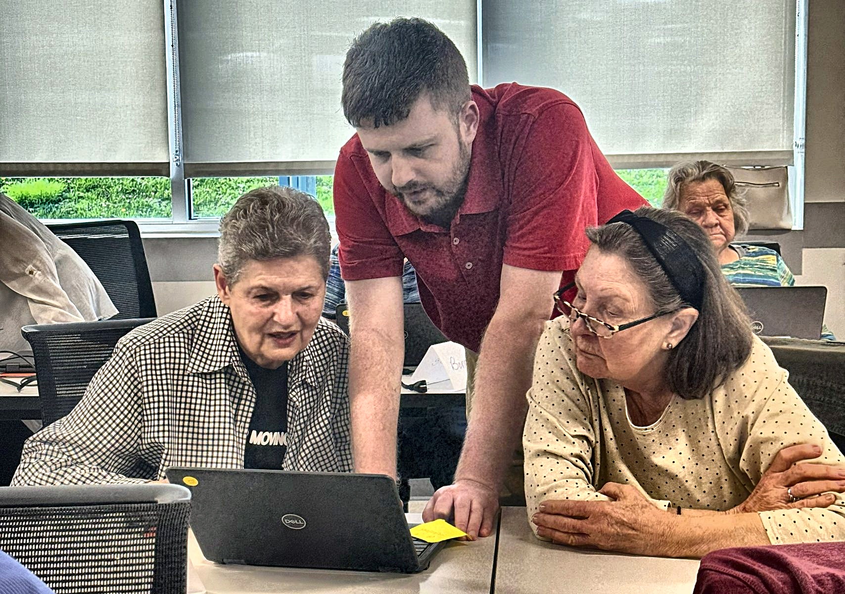 Instructor coaching a participant one-on-one